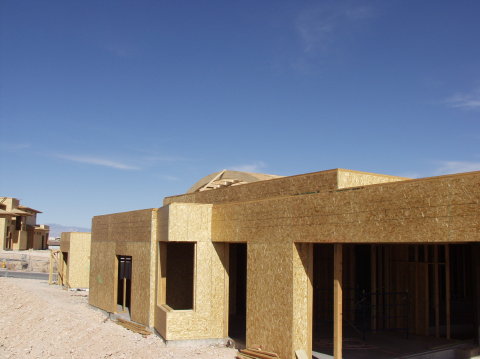 West side view of curved roof