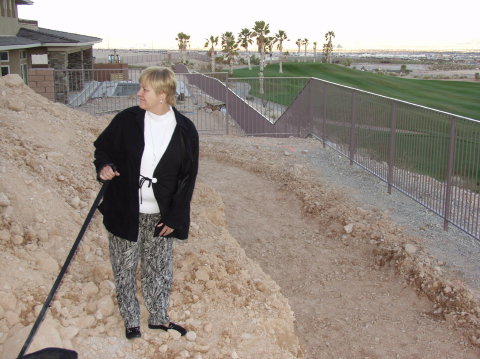 Kathy and Bandit survey rockwall trench